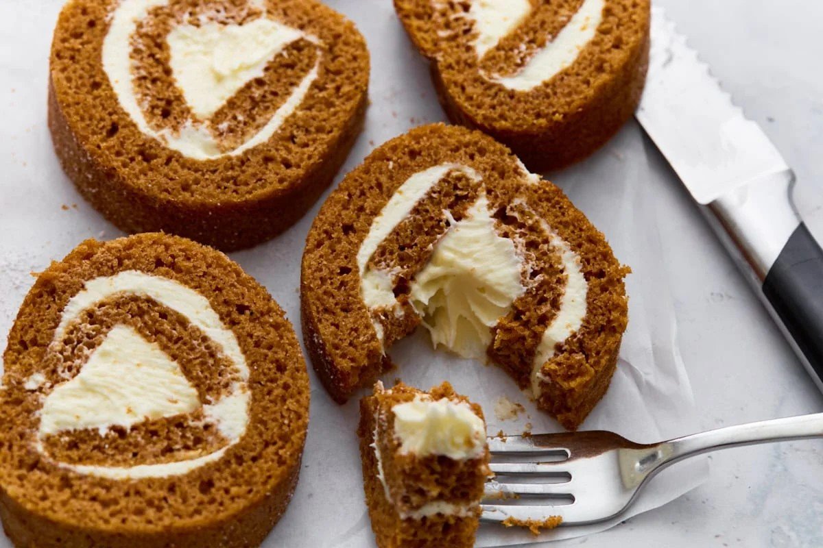 Sliced gluten-free pumpkin roll with cream cheese filling