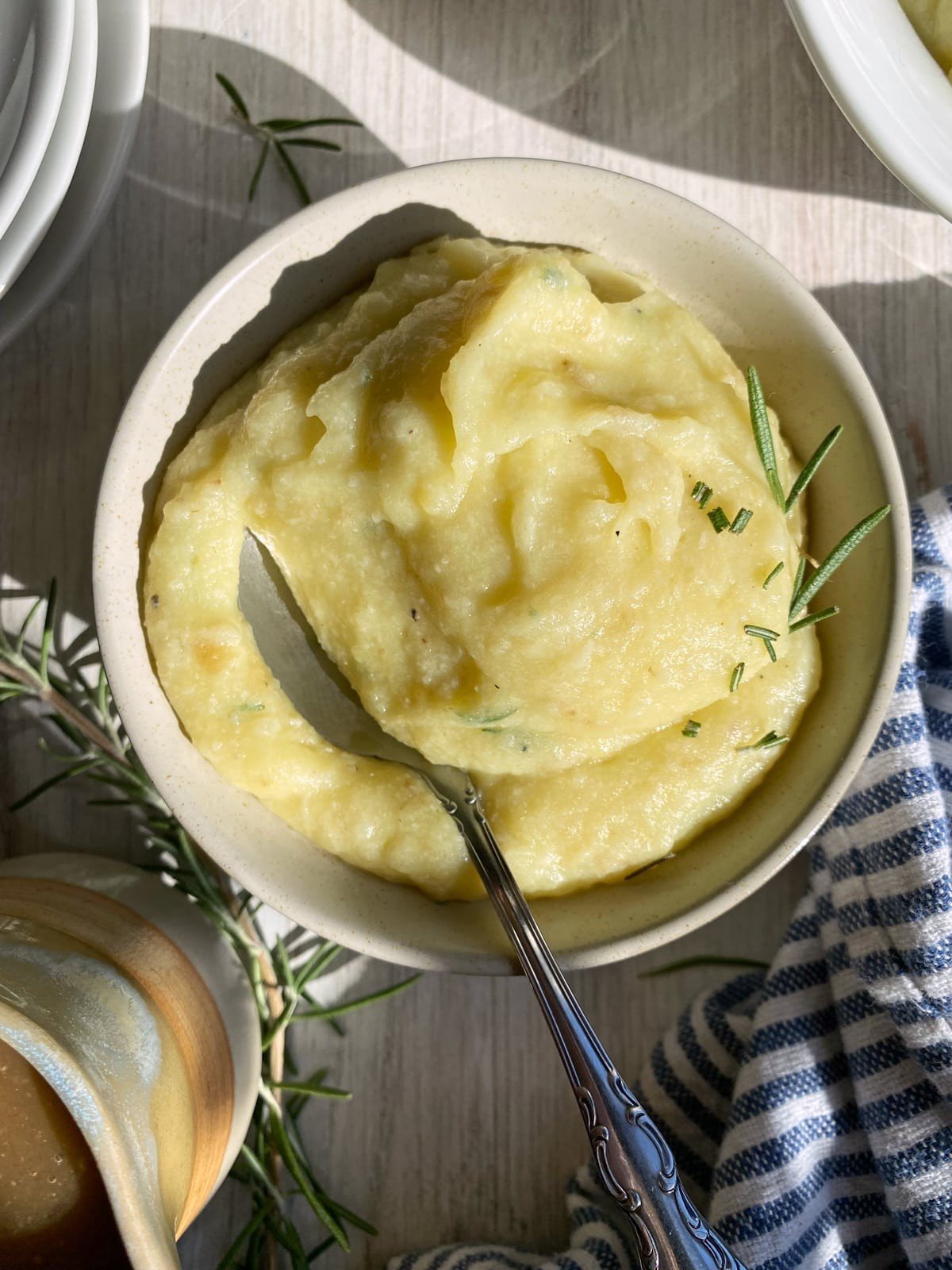 Creamy cauliflower mashed potatoes in a serving bowl