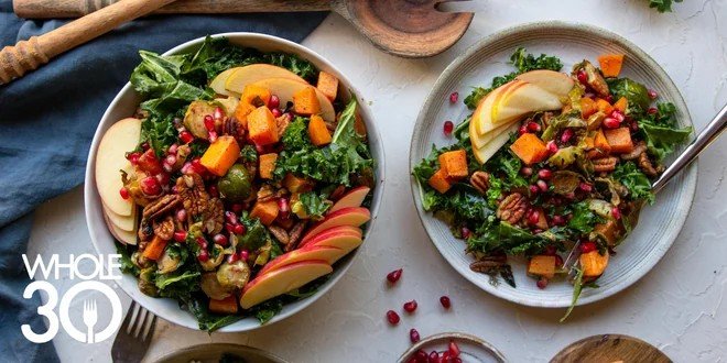 Warm harvest salad with kale, butternut squash, apple, and pomegranate